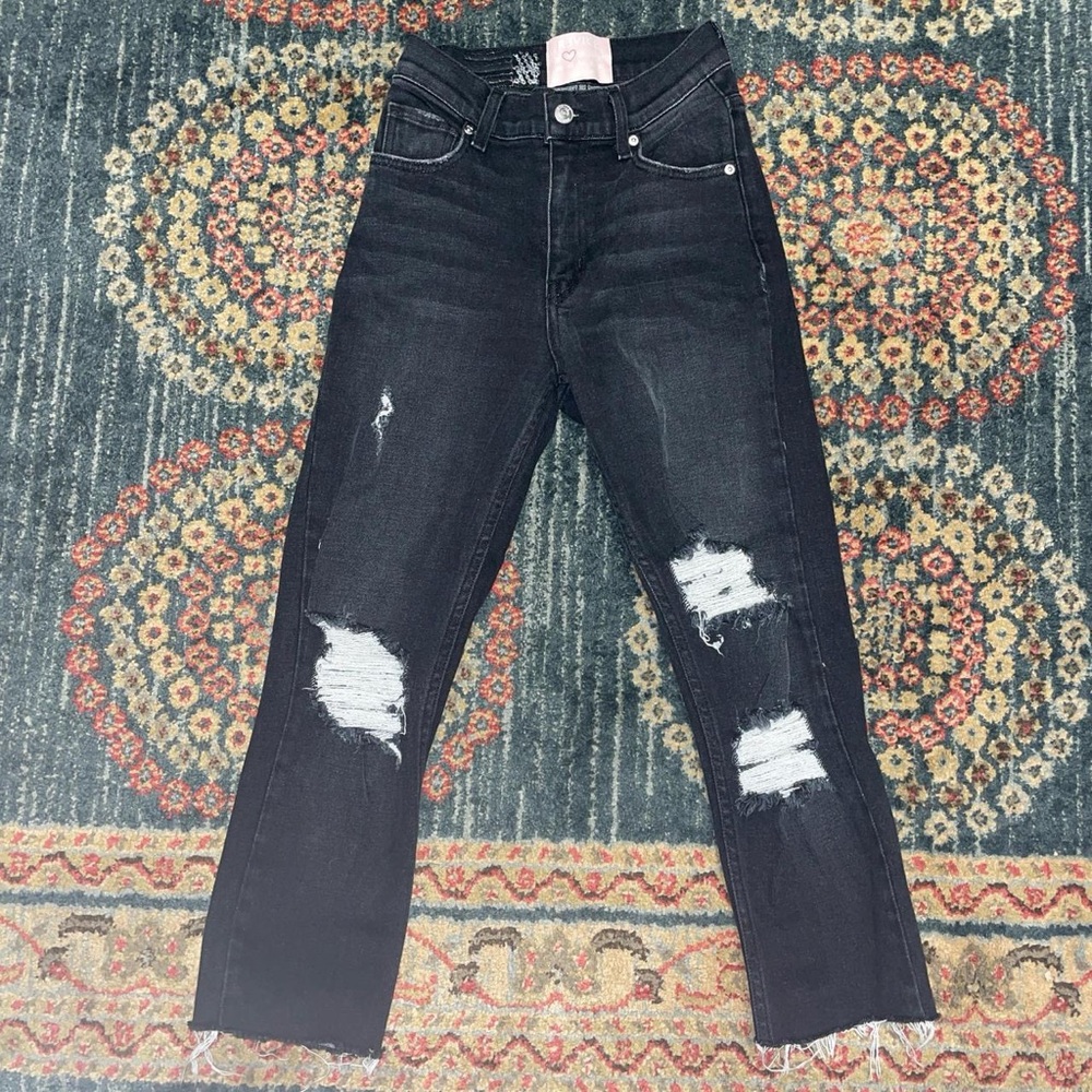 black ripped REVICE jeans